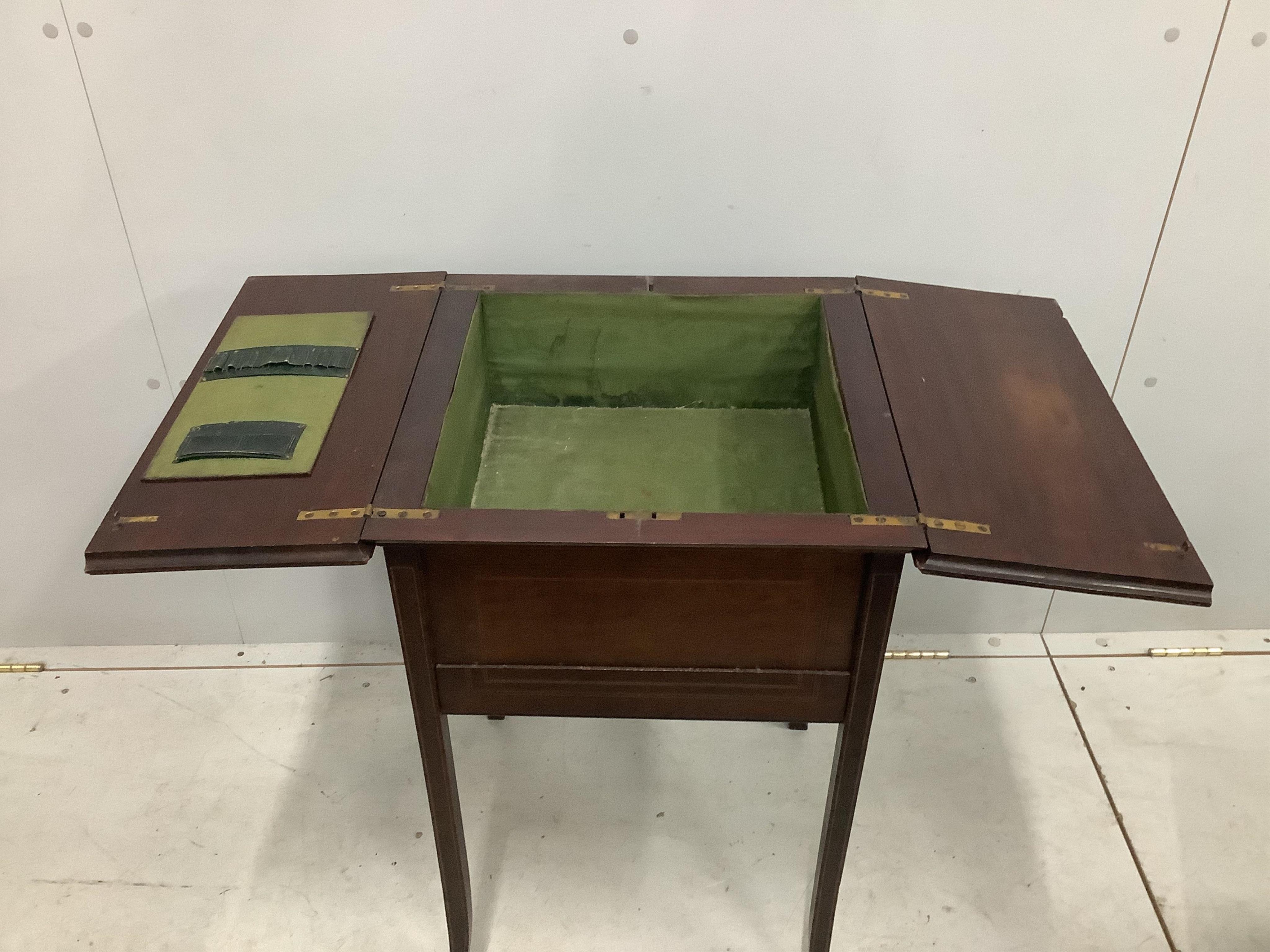 An Edwardian inlaid mahogany work table, width 45cm, depth 46cm, height 72cm. Condition - poor to fair